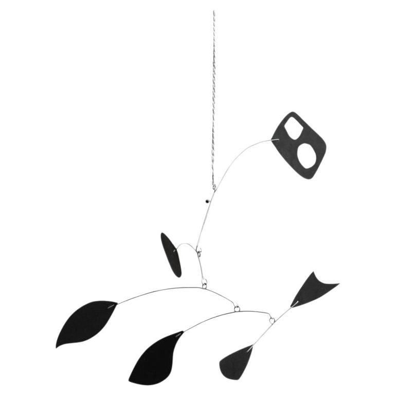 Enchanting Dynamics: Iron and Foam Kinetic Sculpture - Elegant Black in Play For Sale