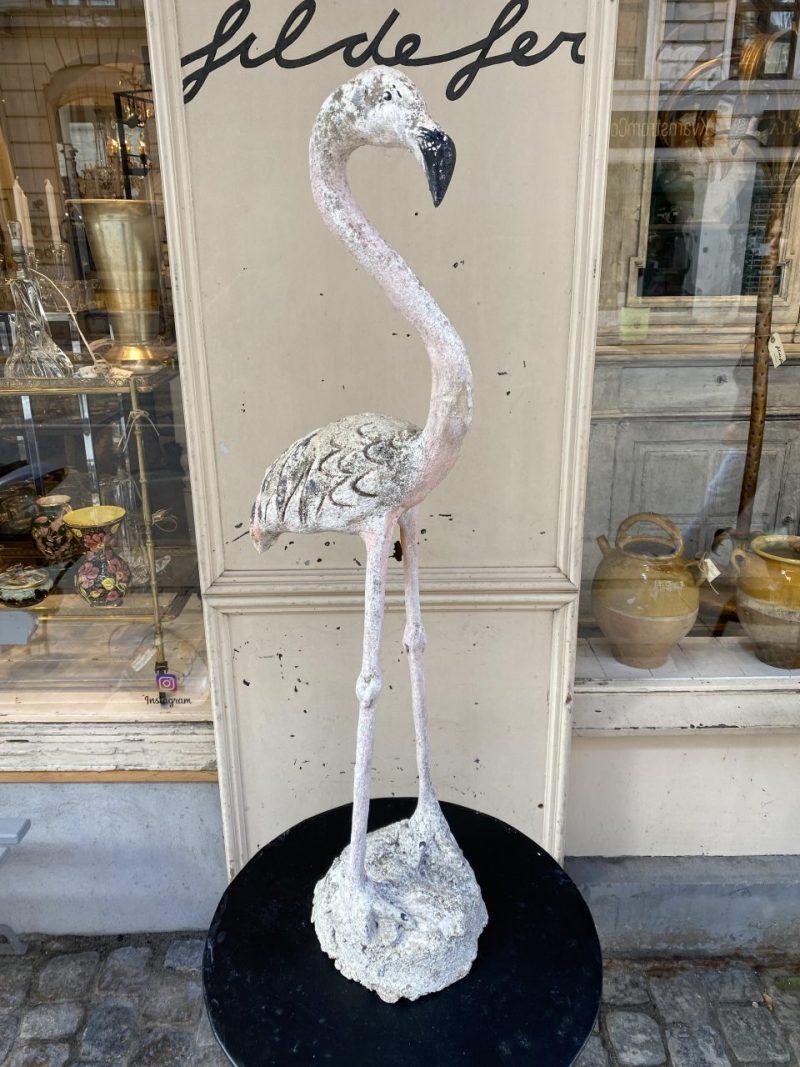 Funky and whimsical French figure, from the South of France. Formed in cast cement in the shape of a flamingo, this figure was made back in the 70s, and has the well-known curved neck, plumage and long thin legs. Puts a smile on your face.

Lots of