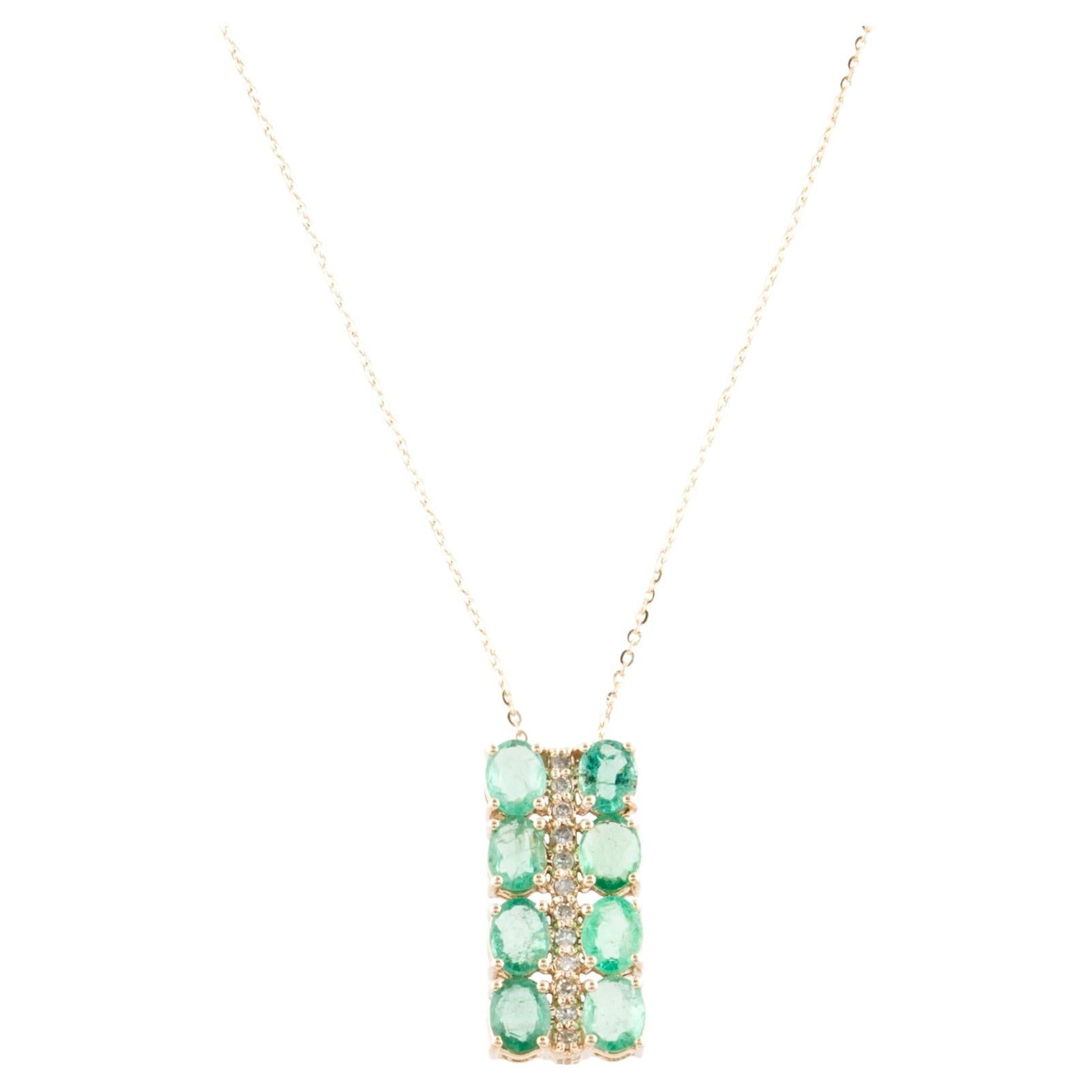 Stunning 14K Emerald & Diamond Pendant Necklace  Elegant Gemstone Sparkle For Sale