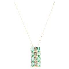 Atemberaubende 14K Smaragd- und Diamant-Anhänger-Halskette  Elegantes Funkeln der Edelsteine