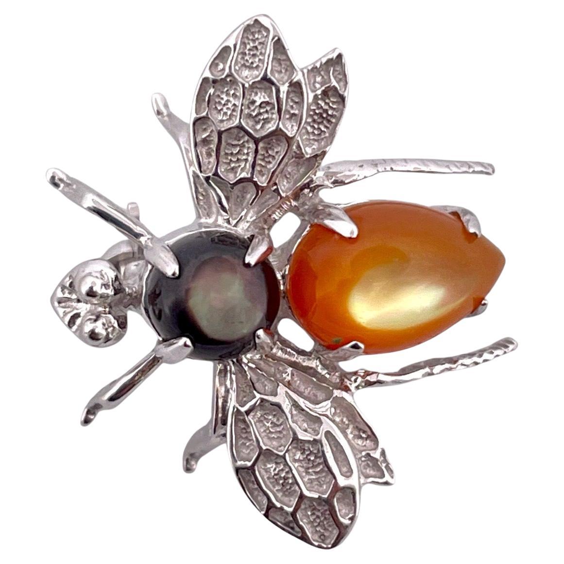 Enchanting Onyx "Cats Eye" Bee Brooch in 14K White Gold For Sale