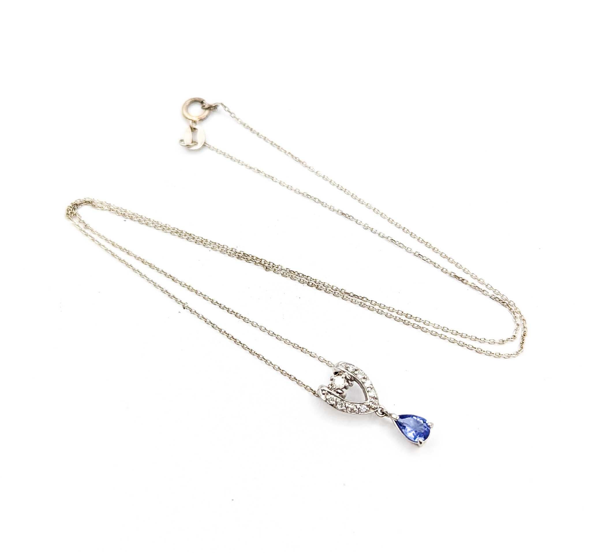 Pear Cut Enchanting Tanzanite and Diamond Pendant in Platinum For Sale