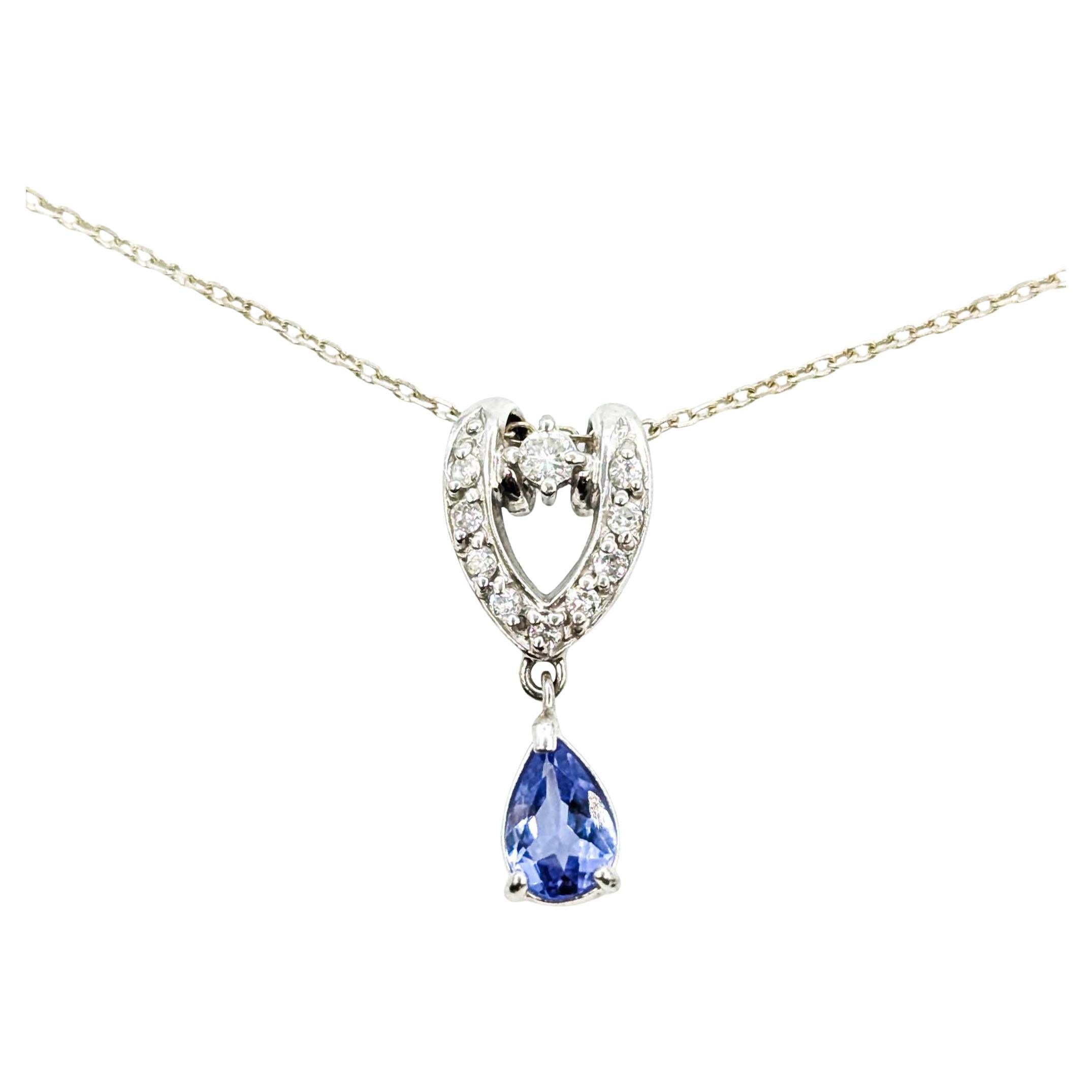Enchanting Tanzanite and Diamond Pendant in Platinum For Sale