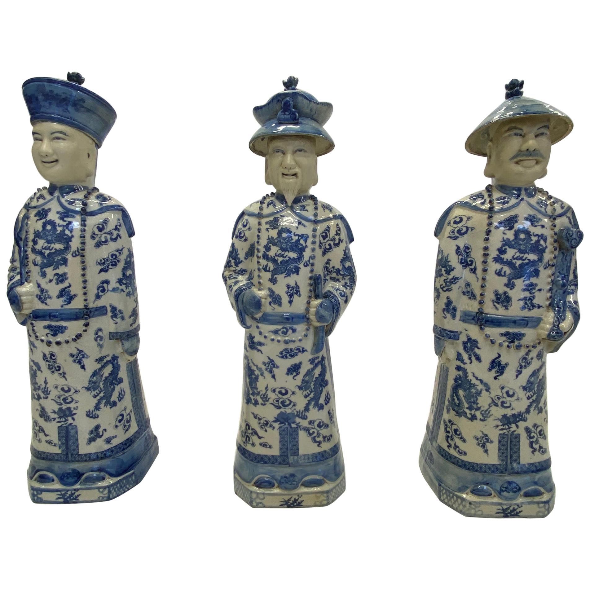 Blue and White Chinese Porcelain Man and Fish Sculpture at 1stDibs