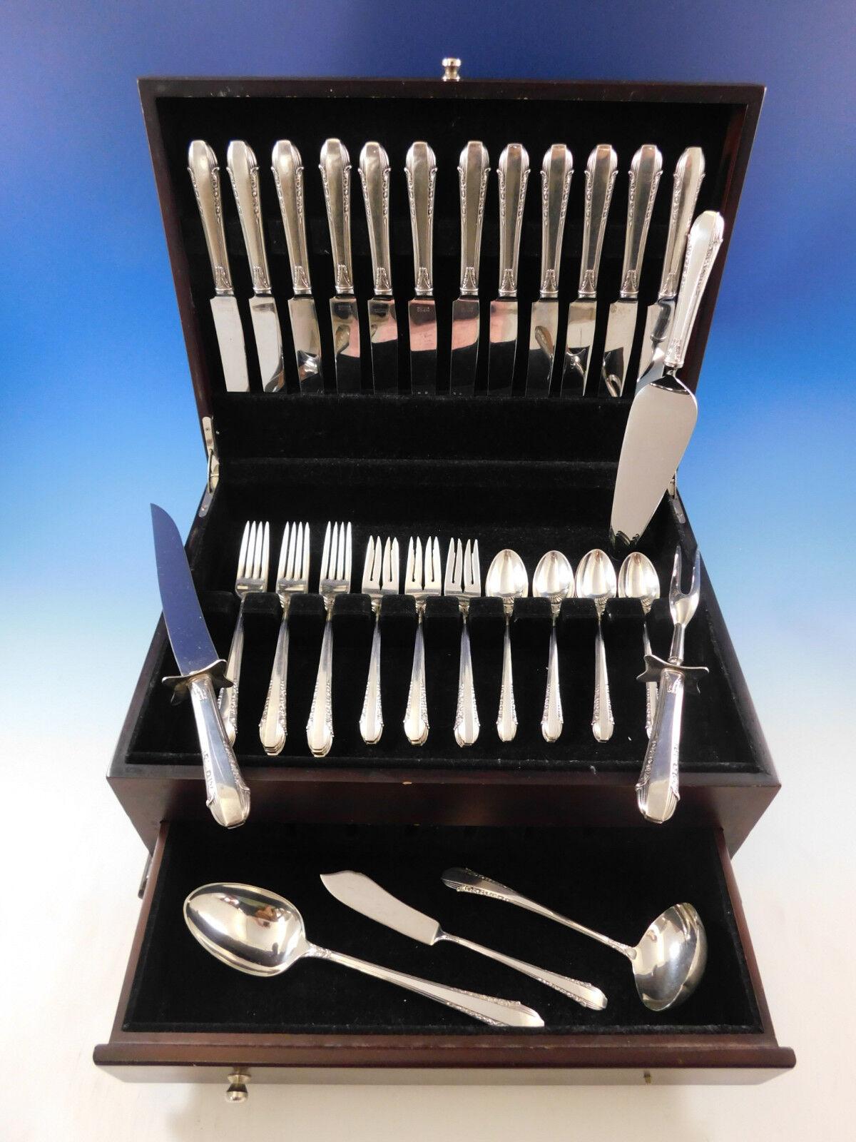 Ensemble de couverts en argent sterling Exquisite Enchantress by International, 54 pièces. Cet ensemble comprend :

12 Couteaux, 9 1/4