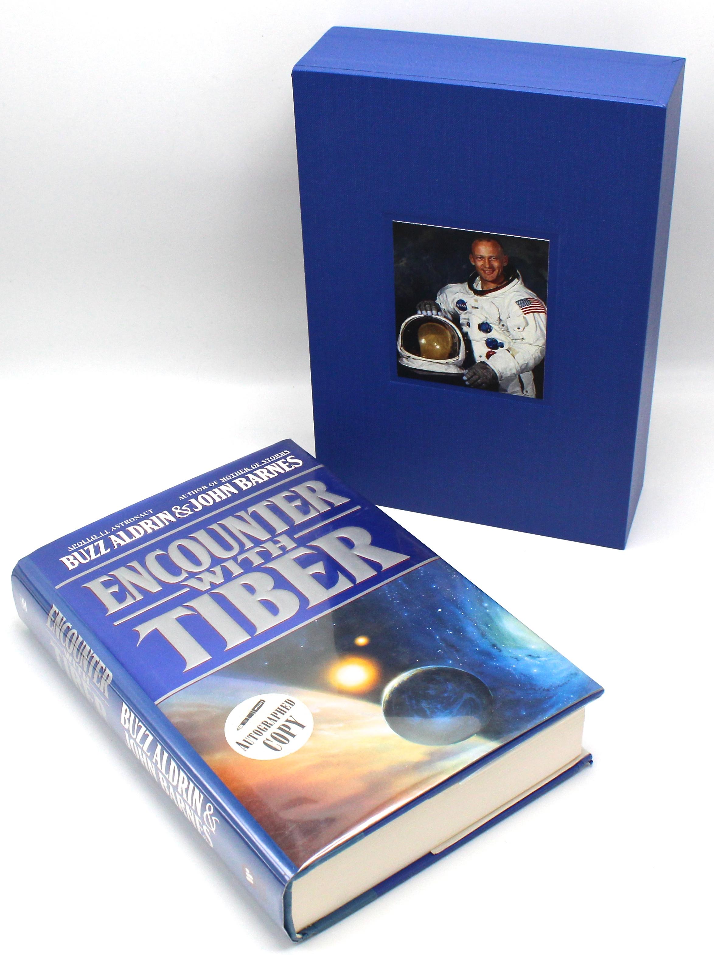 Aldrin, Buzz, Barnes, John, Encounter with Tiber. New York: Warner Books, 1996. Signed First Edition. Original dust jacket.

Presented is the first edition of Buzz Aldrin's ?Encounter with Tiber?, which we wrote in conjunction with John Barnes. The