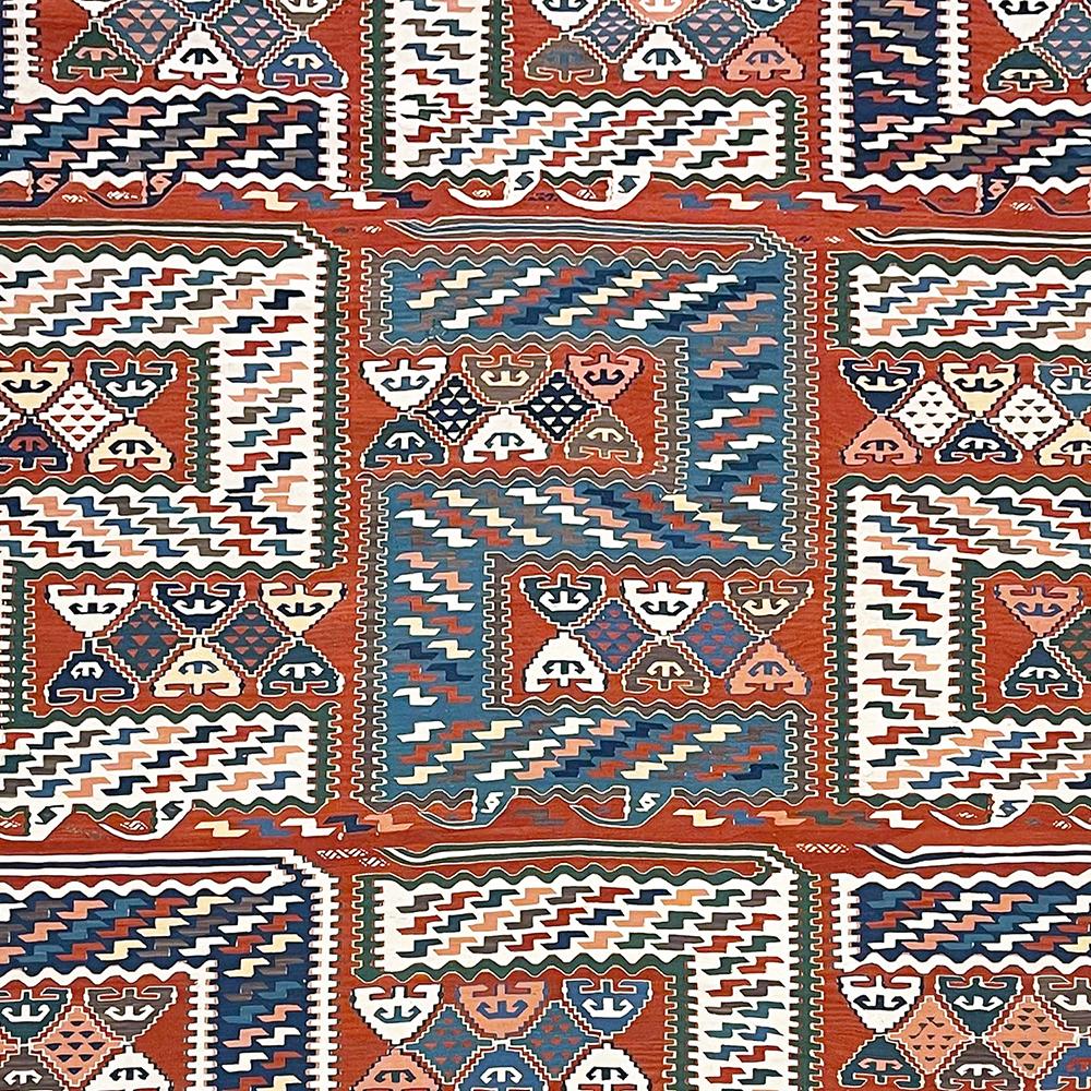 End-20th Century Handwoven Wool Anatolian Vintage Kilim

This vintage kilim from Turkey was handwoven in the second half of the 20th century. This kilim was traditionally handwoven. A beautiful and very rare work in the Sileh kilim style. The kilim