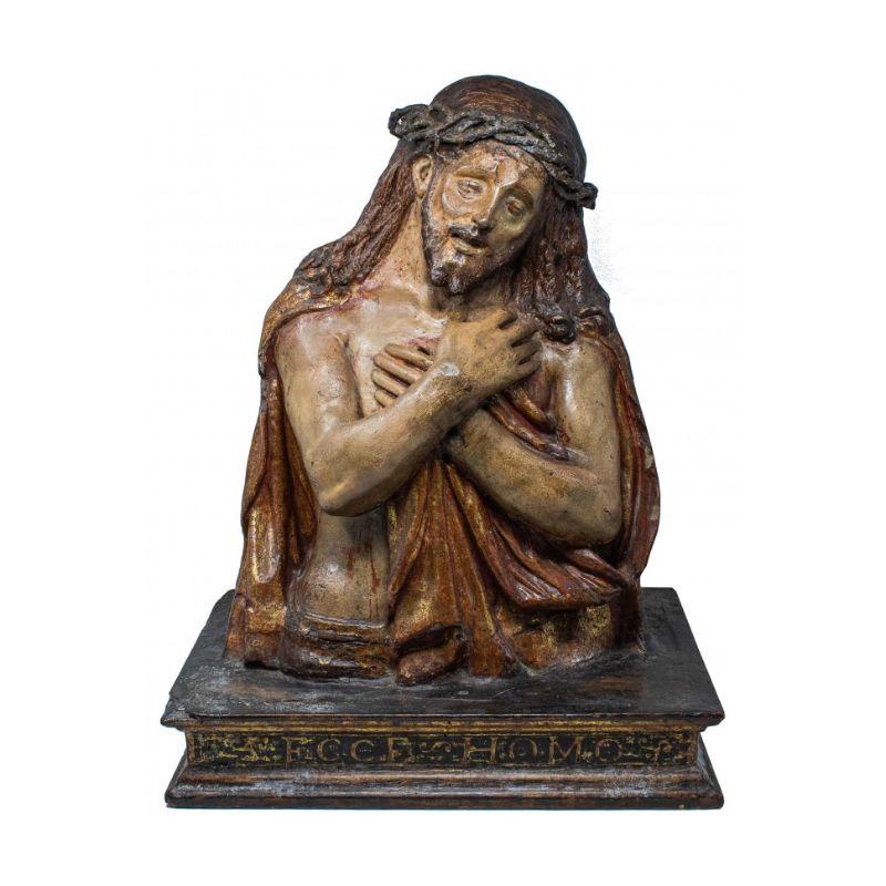 Late 16th - early 17th century Ecce Homo

Papier-mâché and terracotta, cm alt. 56 x depth 29 x width. (base) 43

The Christ, represented half-length while reaching forward with his arms crossed with his wrists superimposed towards his