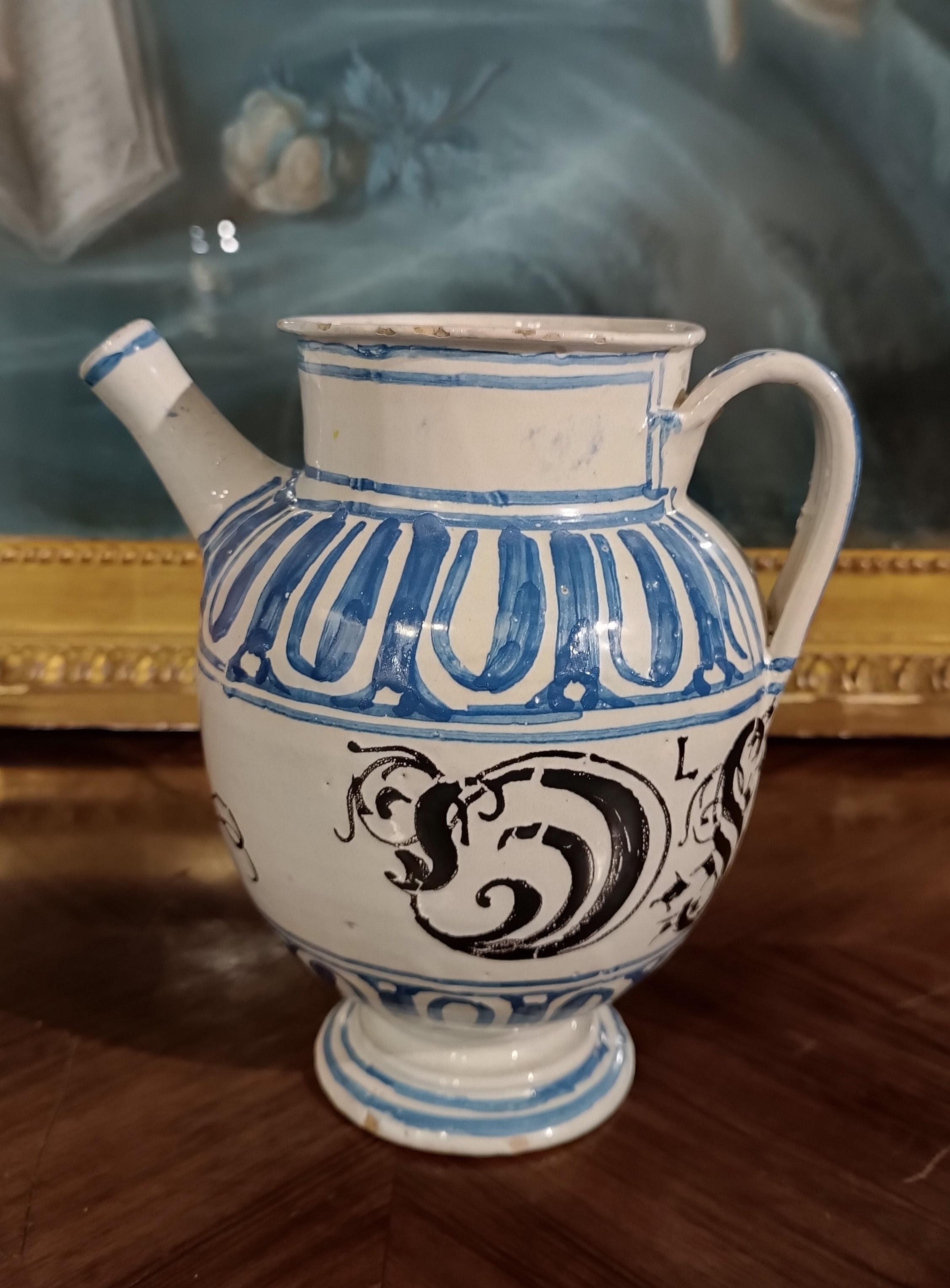 Enameled END OF THE 17th CENTURY WHITE AND BLUE MAJOLICA JUG 