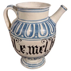 END OF THE 17th CENTURY WHITE AND BLUE MAJOLICA JUG 