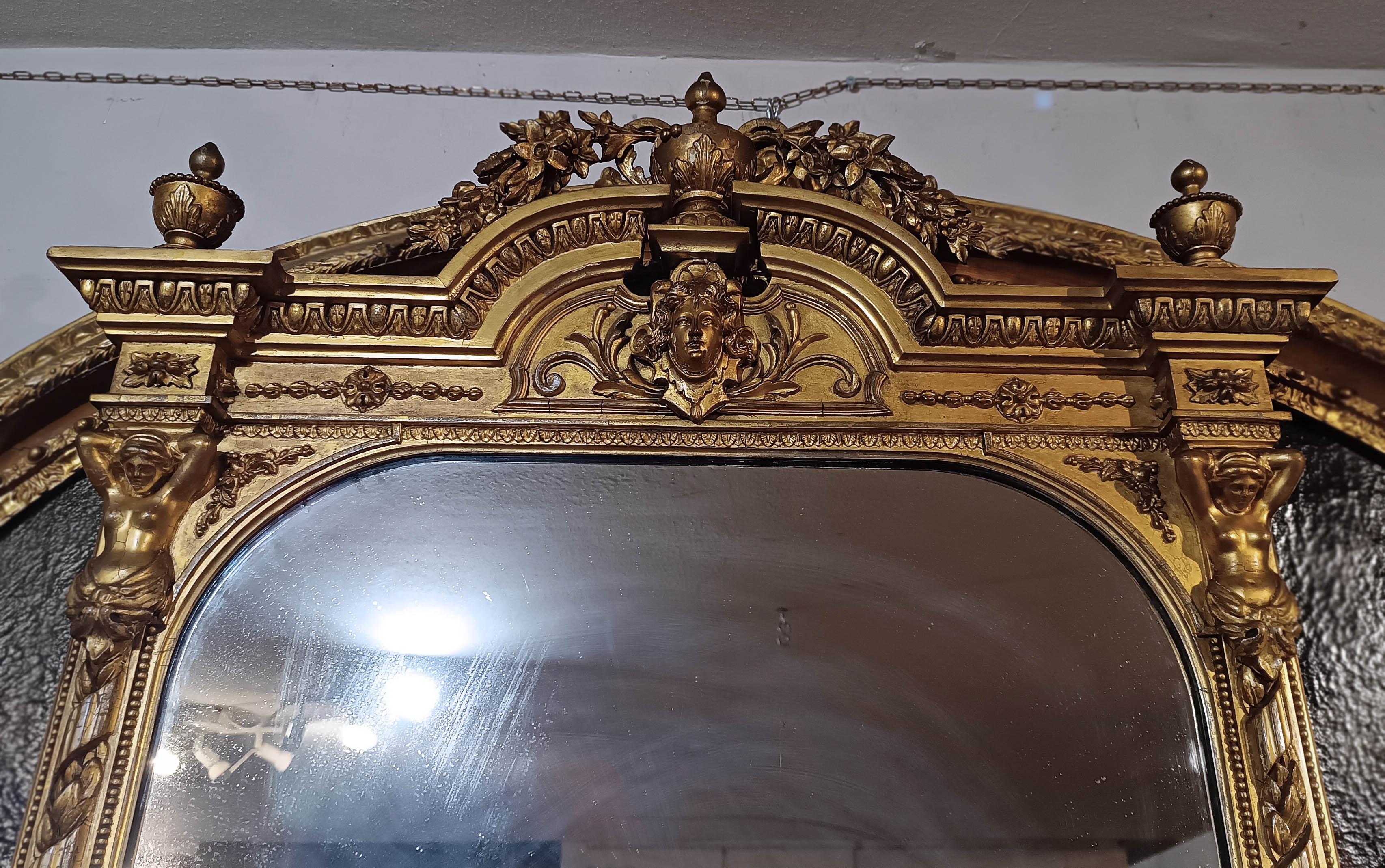 Italian END OF THE 18th CENTURY GOLDEN MIRROR WITH CARYATIDS For Sale