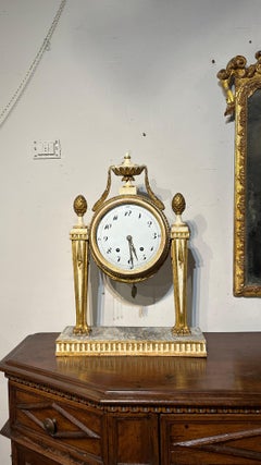 END OF THE 18th CENTURY NEOLASSIC WOODEN CLOCK WITH GOLD FINISHES