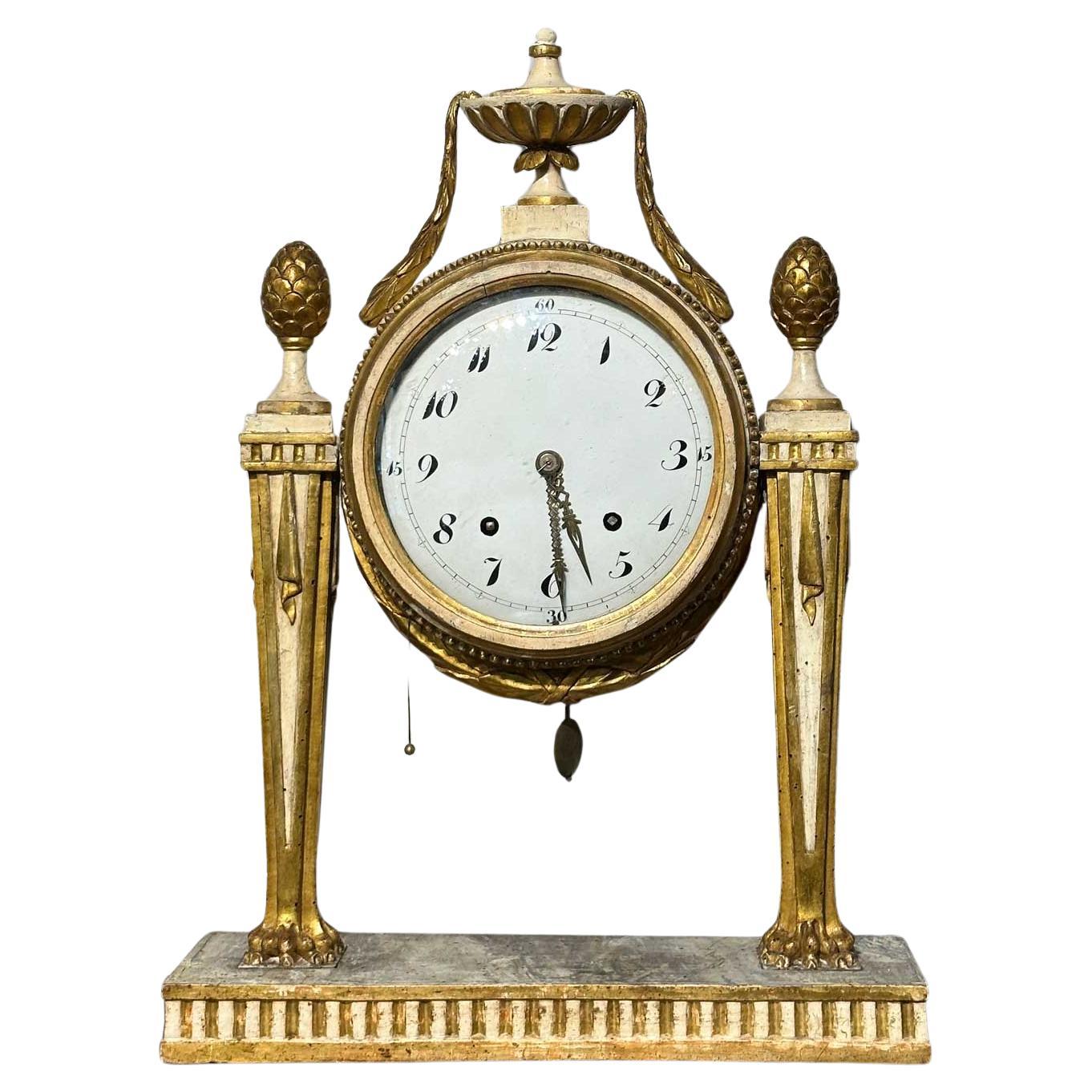 END OF THE 18th CENTURY NEOLASSIC WOODEN CLOCK WITH GOLD FINISHES 