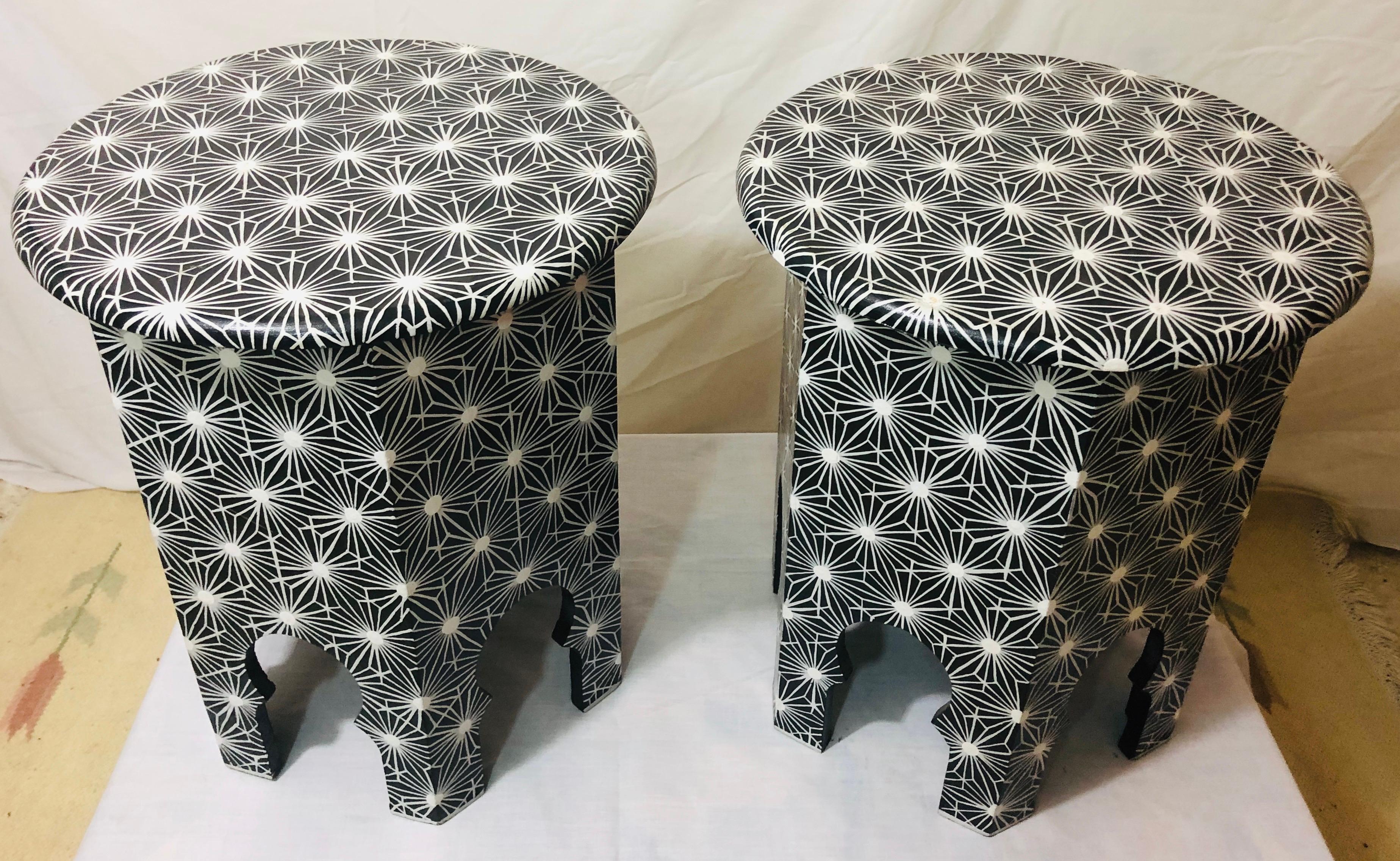 End, side or lamp table modern Moroccan in black and white, a pair

This stylish pair of black and white handmade side or end tables have beautiful arched base and features a modern overall design.

Dimensions: 17.5” D, 20” H.