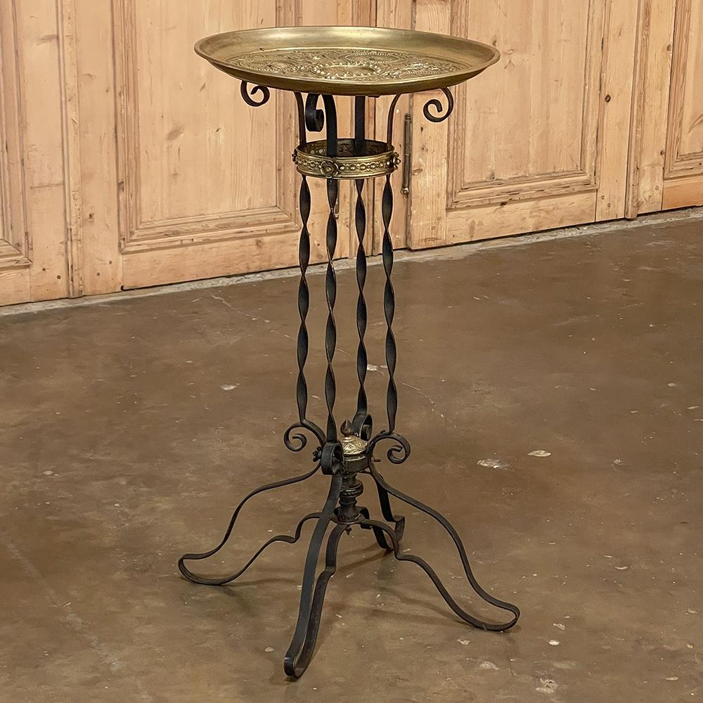 19th century embossed brass & wrought iron end table shows amazing detail in full relief in a circular charger pattern, emphasizing a combination of geometric forms, stylized scrollwork and foliates, and now less than four crowned princesses! It's