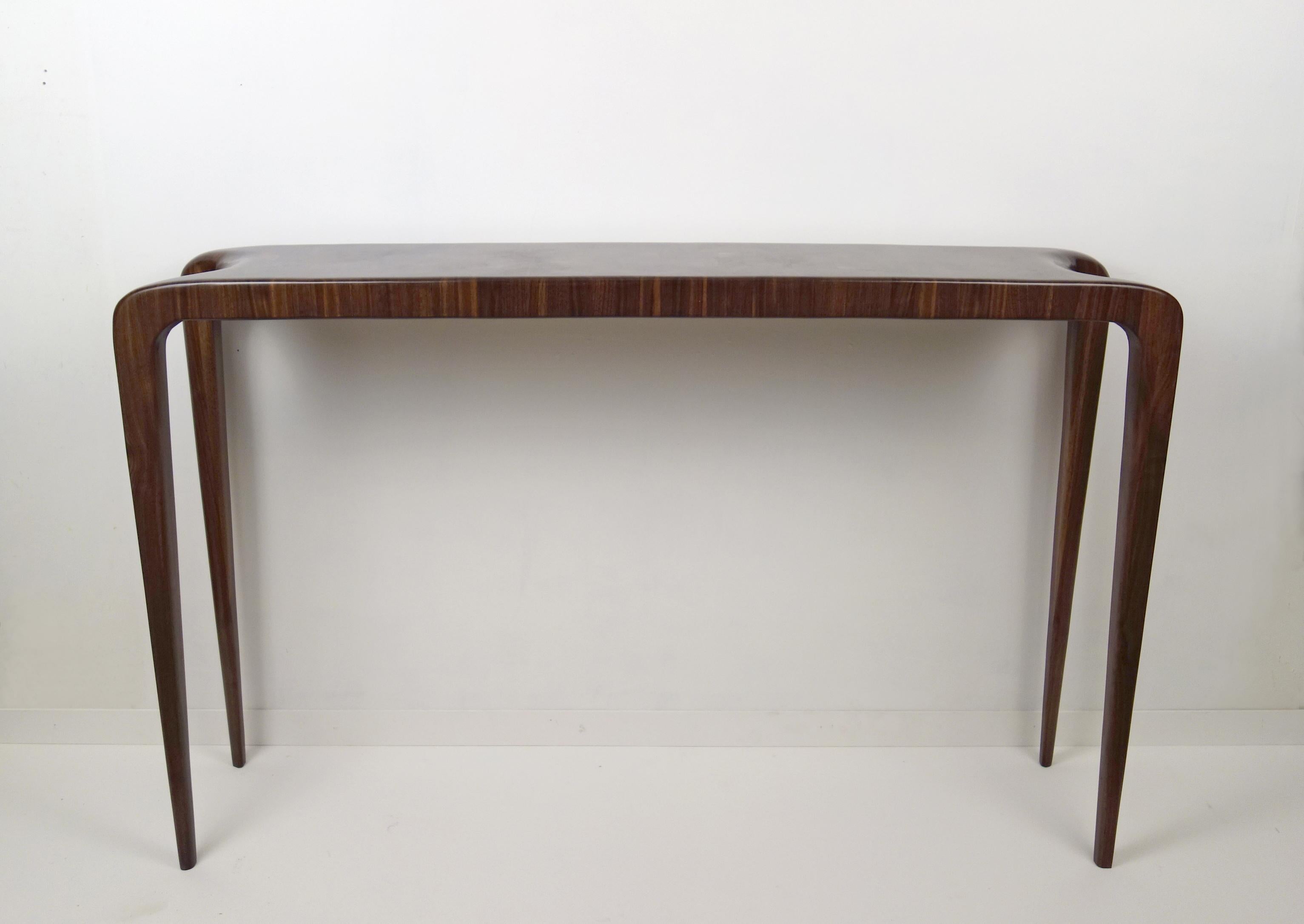 Endgrain Console by Aaron Scott
Dimensions: D 28 x W 127 x H 81.5 cm
Materials: Walnut.


Brooklyn-based designer Aaron Scott was raised in the mountains and forests of Southwest Oregon. He studied philosophy at the University of
