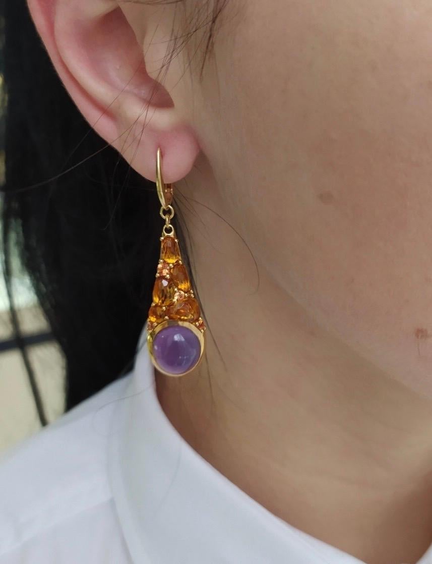 This pair is designed to bring a boost of positive energy to its owner.

Amethyst is a natural tranquiliser, it relieves stress and strain, soothes irritability, balances mood swings, dispels anger, rage, fear and anxiety. Alleviates sadness and