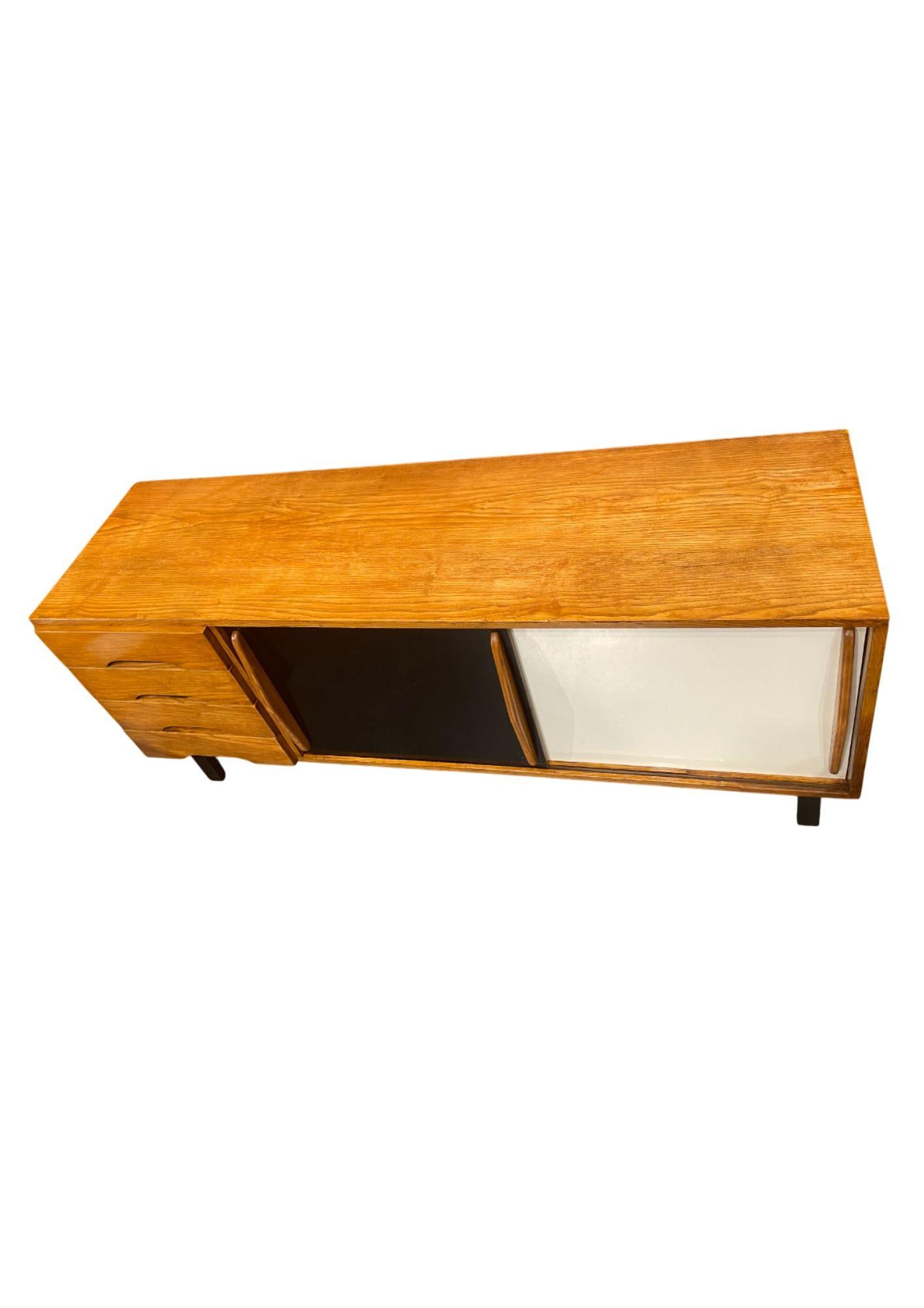 Sublime enfilade by French designer Charlotte Perriand measuring 70 x 158 x 45 cm
