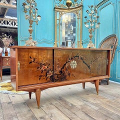Chinese sideboard with gold lacquered panels