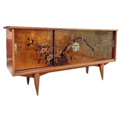 Chinese sideboard with gold lacquered panels