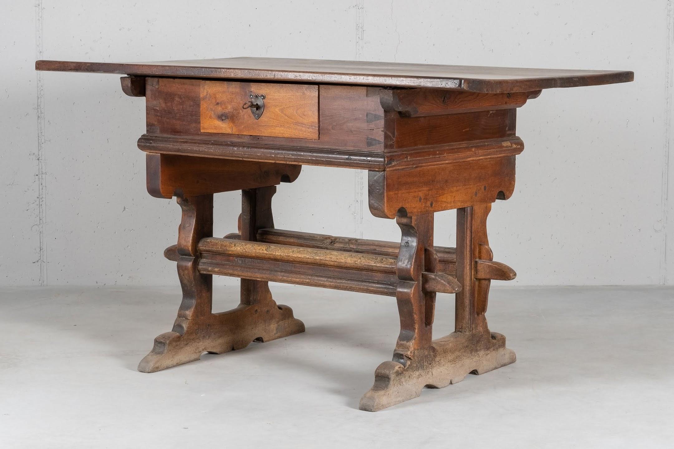 Table typical of the Engadine region in the central south Switzerland. Built in solid walnut in the 17th century, with later modifications.