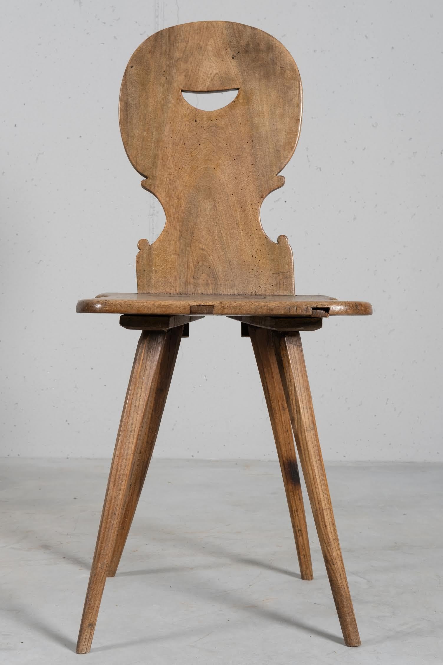 Primitive sculptural chair. Solid oak with an incredible patina.