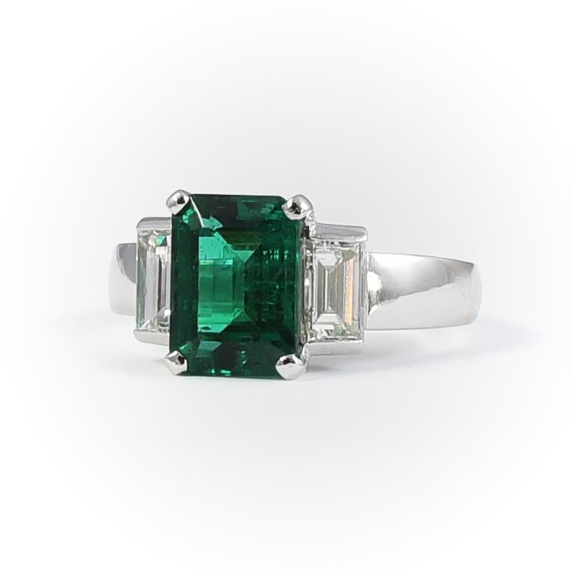 handmade in 18k white gold engagement ring with 1 emerald 2.95 carats and 2 baguette cut diamonds 1.22 carats.
Perfect for cocktail parties and gala happenings.