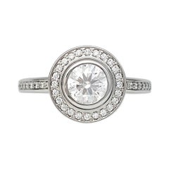 Bague de fiançailles Cartier en platine:: diamant de 0::61 carat