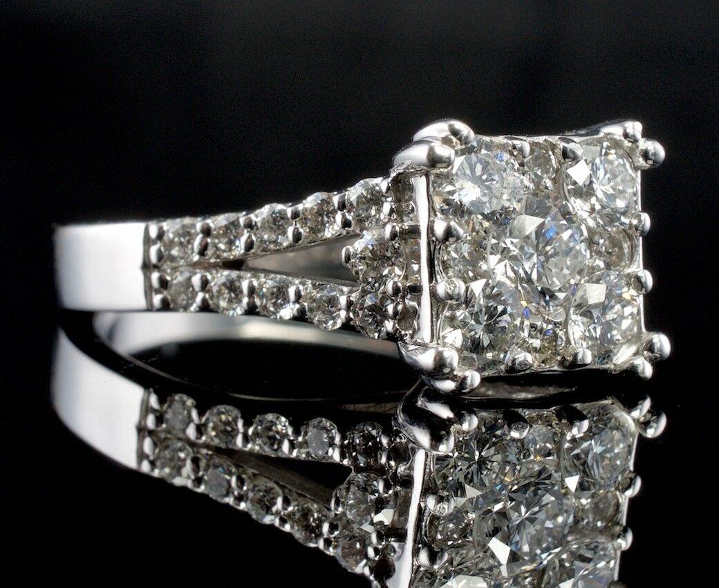 Engagement Diamond Ring 14K White Gold Vintage Estate .72 TDW

This beautiful vintage ring is finely crafted in solid 14K White Gold and set with white and fiery diamonds. 
There are Nine diamonds in the center and twenty-two side diamonds. 
These