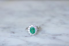 Engagement Emerald & Diamonds Cluster Ring on White Gold