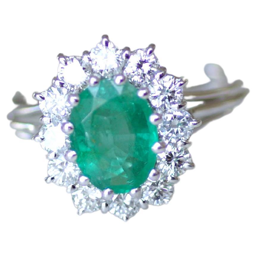 Engagement Emerald & Diamonds Cluster Ring on White Gold
