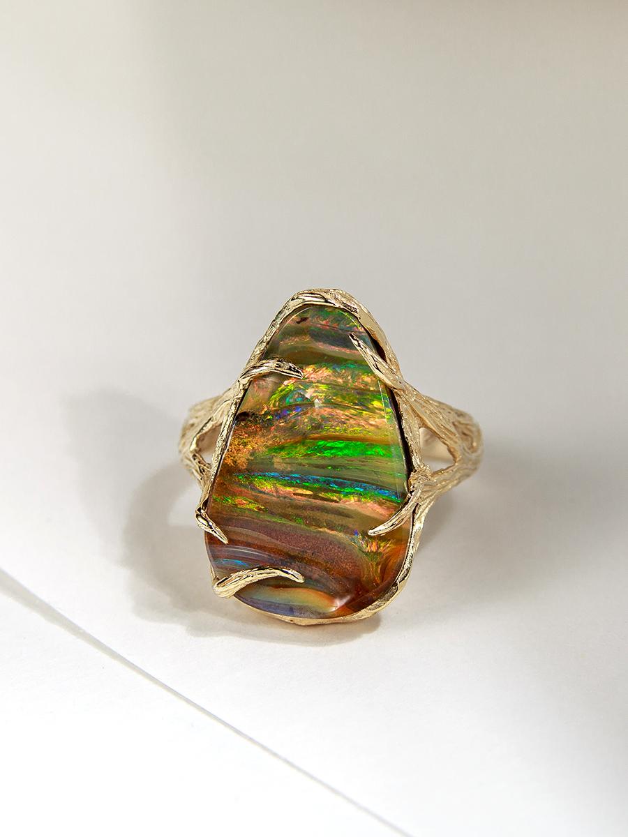 14K yellow gold ring with natural Boulder Opal
opal origin - Australia
opal weight - 14 carats
stone measurements - 0.16 х 0.55 х 0.87 in / 4 х 14 х 22 mm
ring weight - 7.45 grams
ring size - 7.25 US


We ship our jewelry worldwide – for our