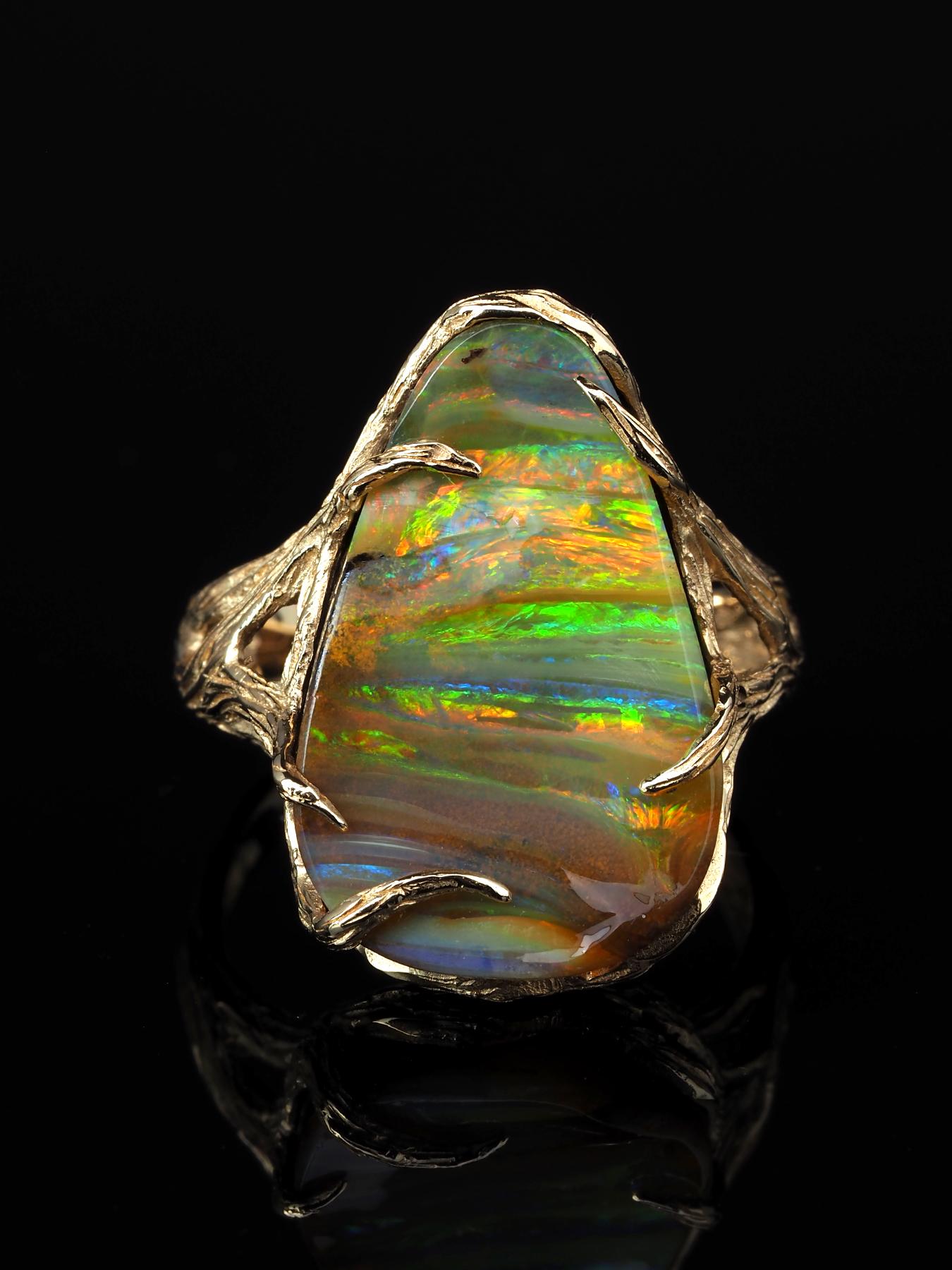 14K yellow gold ring with natural Boulder Opal
opal origin - Australia
opal weight - 14 carats
stone measurements - 0.16 х 0.55 х 0.87 in / 4 х 14 х 22 mm
ring weight - 7.45 grams
ring size - 7.25 US


We ship our jewelry worldwide – for our