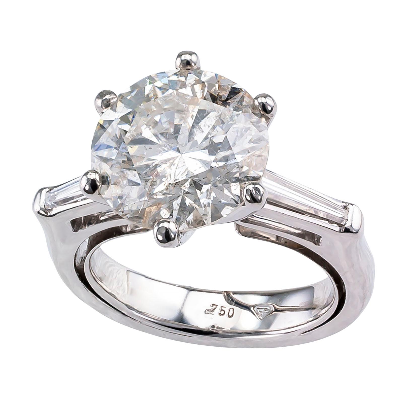 Engagement ring 4.43 carats round diamond solitaire and white gold circa 1970.

DETAILS:

DIAMONDS:  one round brilliant-cut diamond weighing approximately 4.43 carats, accompanied by an appraisal report from EGL-USA stating that the diamond is