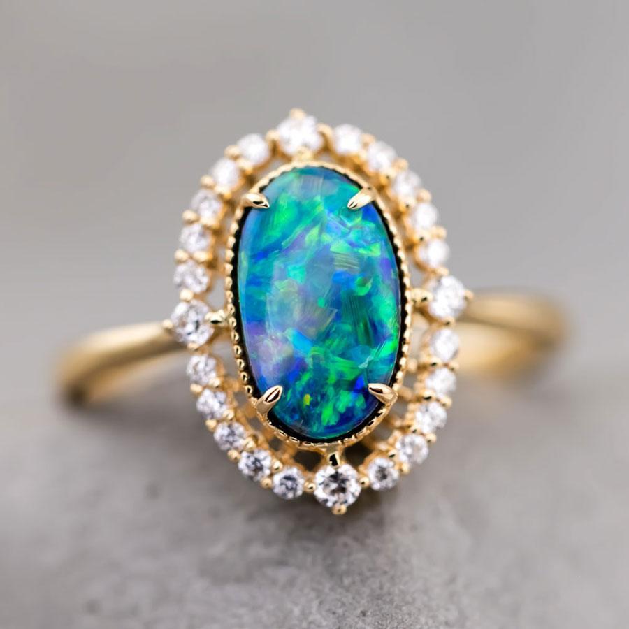 Engagement Ring: Australian Black Opal and Diamond in 18K Yellow Gold


Free Domestic USPS First Class Shipping! Free Gift Bag or Box with every order!



Opal—the queen of gemstones, is one of the most beautiful gemstones in the world. Every piece