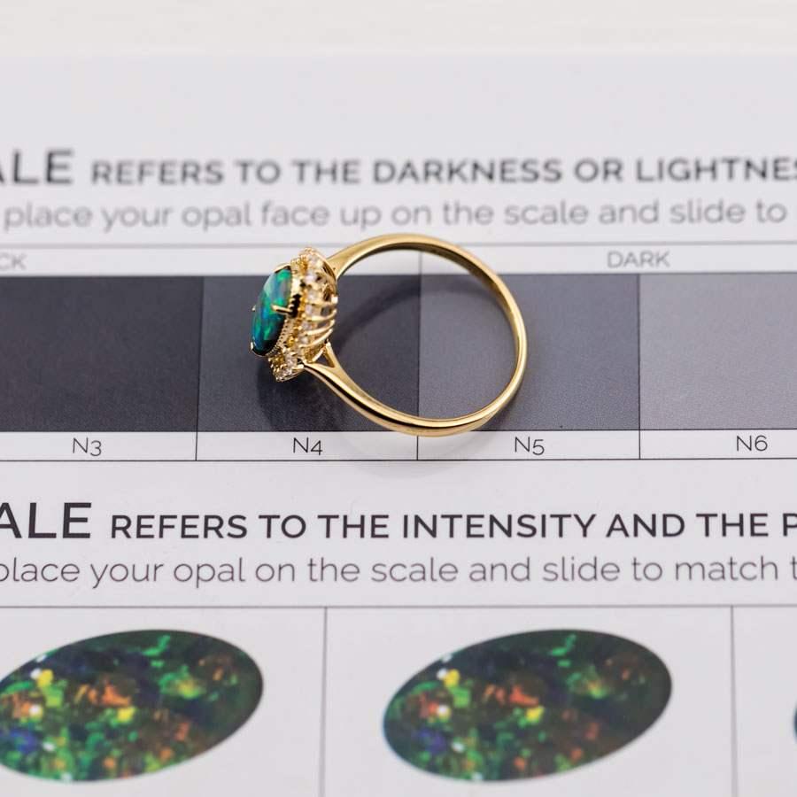 Brilliant Cut Engagement Ring: Australian Black Opal and Diamond in 18K Yellow Gold