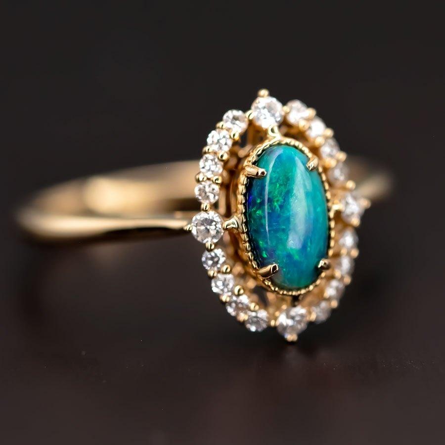 Oval Cut Engagement Ring: Australian Black Opal and Diamond in 18K Yellow Gold For Sale