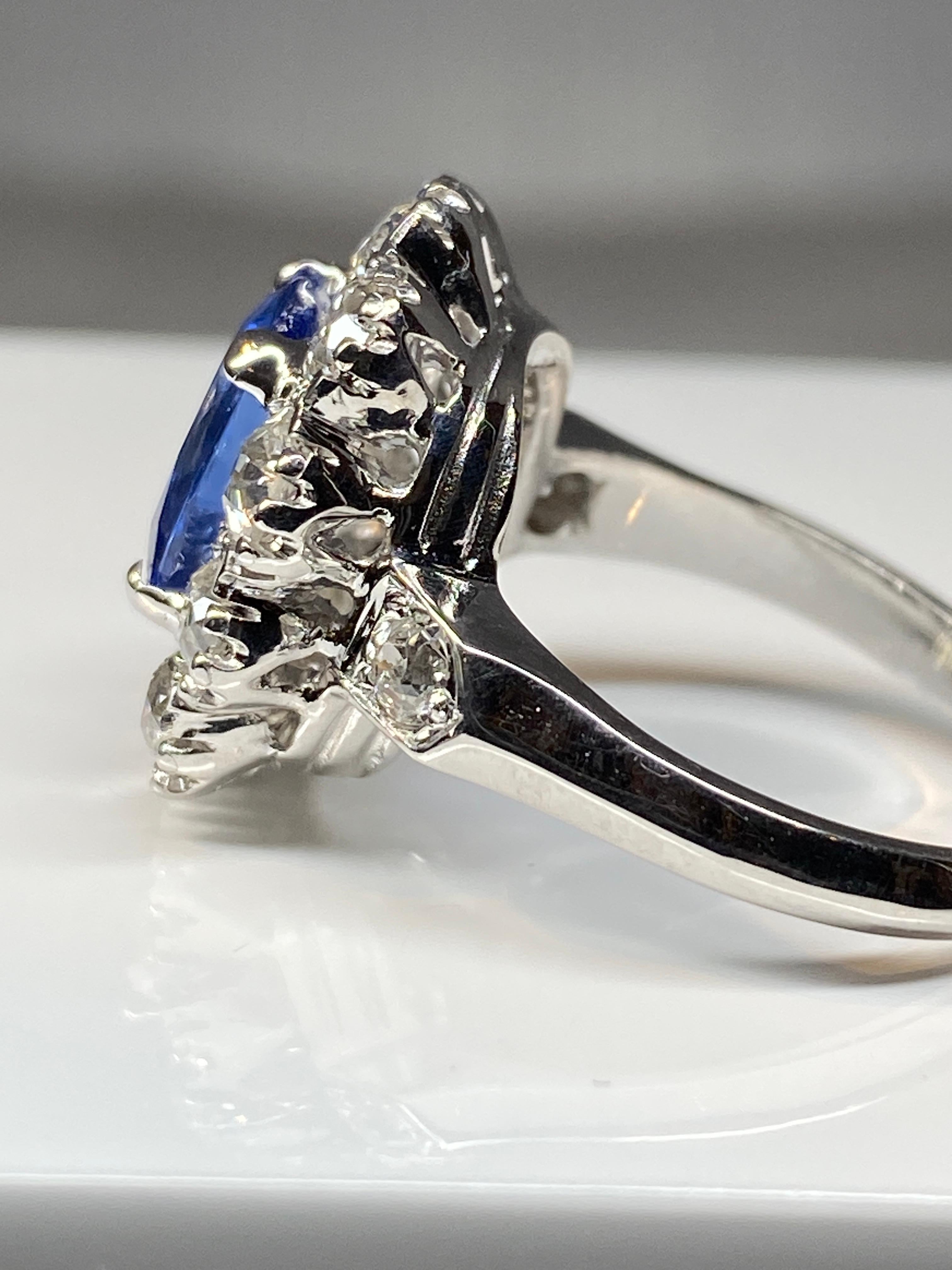 Modern Engagement Ring in 18 Carat Gold, 'Pompadour' with Sapphire and Diamonds