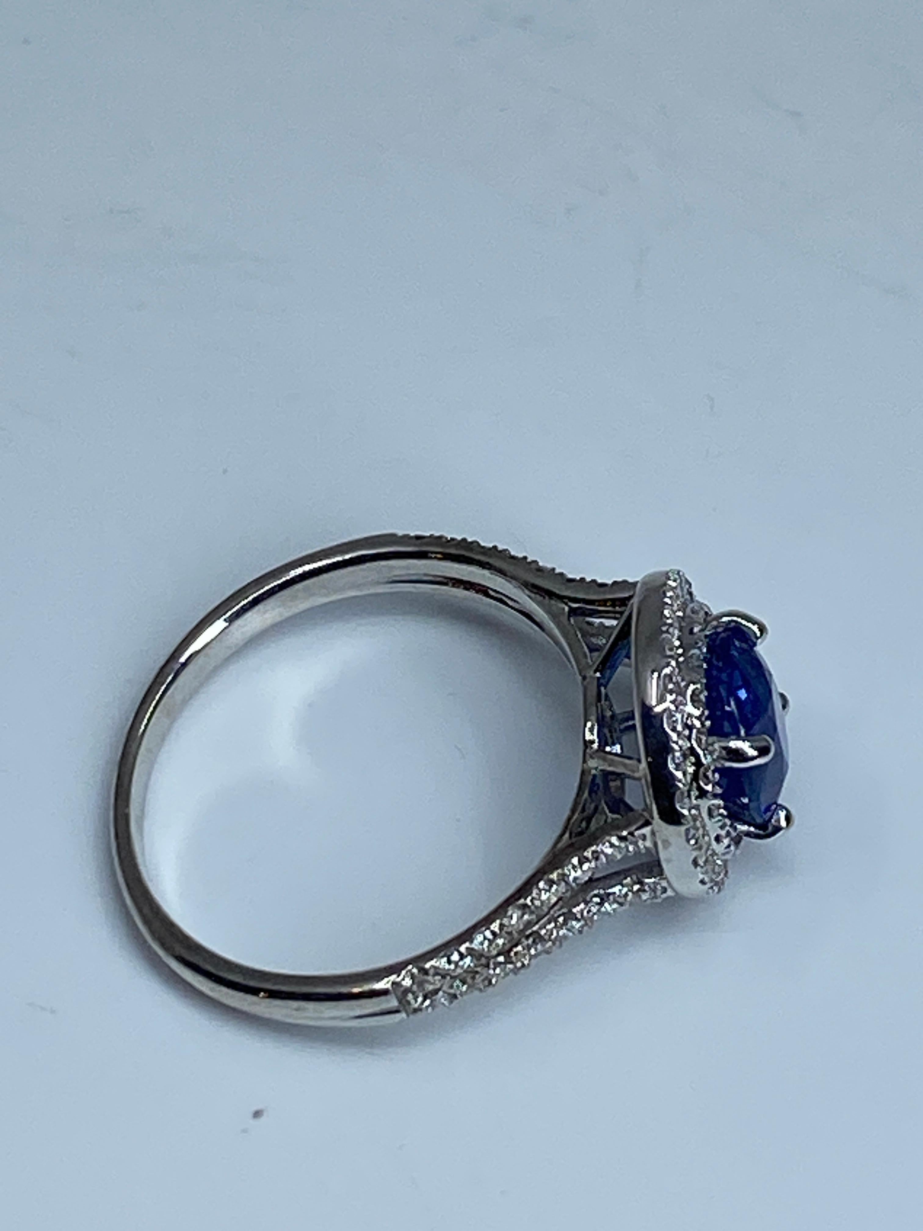 Engagement ring in 18 carat gold set with a sapphire and diamonds  For Sale 14