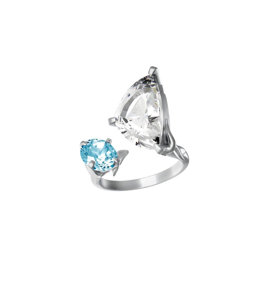 Engagement Ring in Eighteen Karat White Gold with Paraiba Tourmalines In New Condition For Sale In Berlin, DE