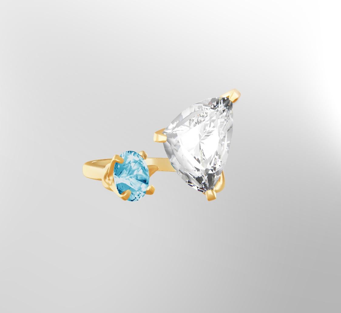 Contemporary Engagement Ring in Eighteen Karat Yellow Gold with Paraiba Tourmalines For Sale