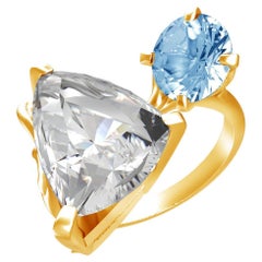 Engagement Ring in Eighteen Karat Yellow Gold with Paraiba Tourmalines
