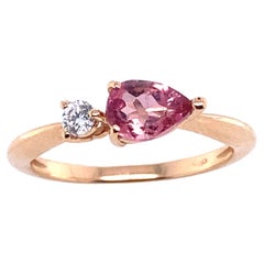Engagement Ring in Pink Gold Topped with a Tourmaline and a Diamond
