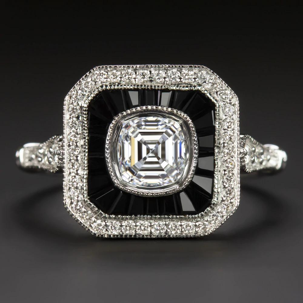 This stunning vintage inspired setting is beautifully designed with stunning contrast and color. The elegant geometric mounting is set with brilliant white and vibrant natural diamonds and natural black onyx cut to size and finished with fine