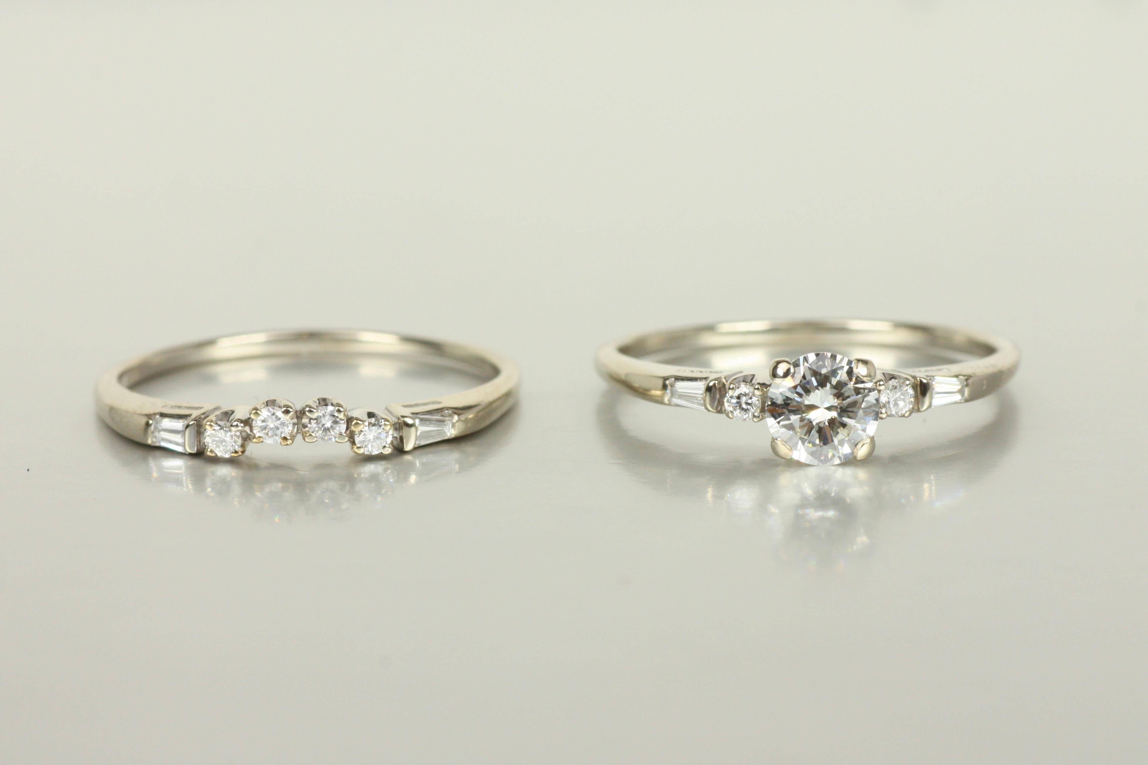 This delicate and feminine engagement ring set combines vintage-inspired elegance with modern craftsmanship. The engagement ring features a dazzling 0.52ct round brilliant diamond (VVS2, H), complemented by six full-cut round diamonds and four
