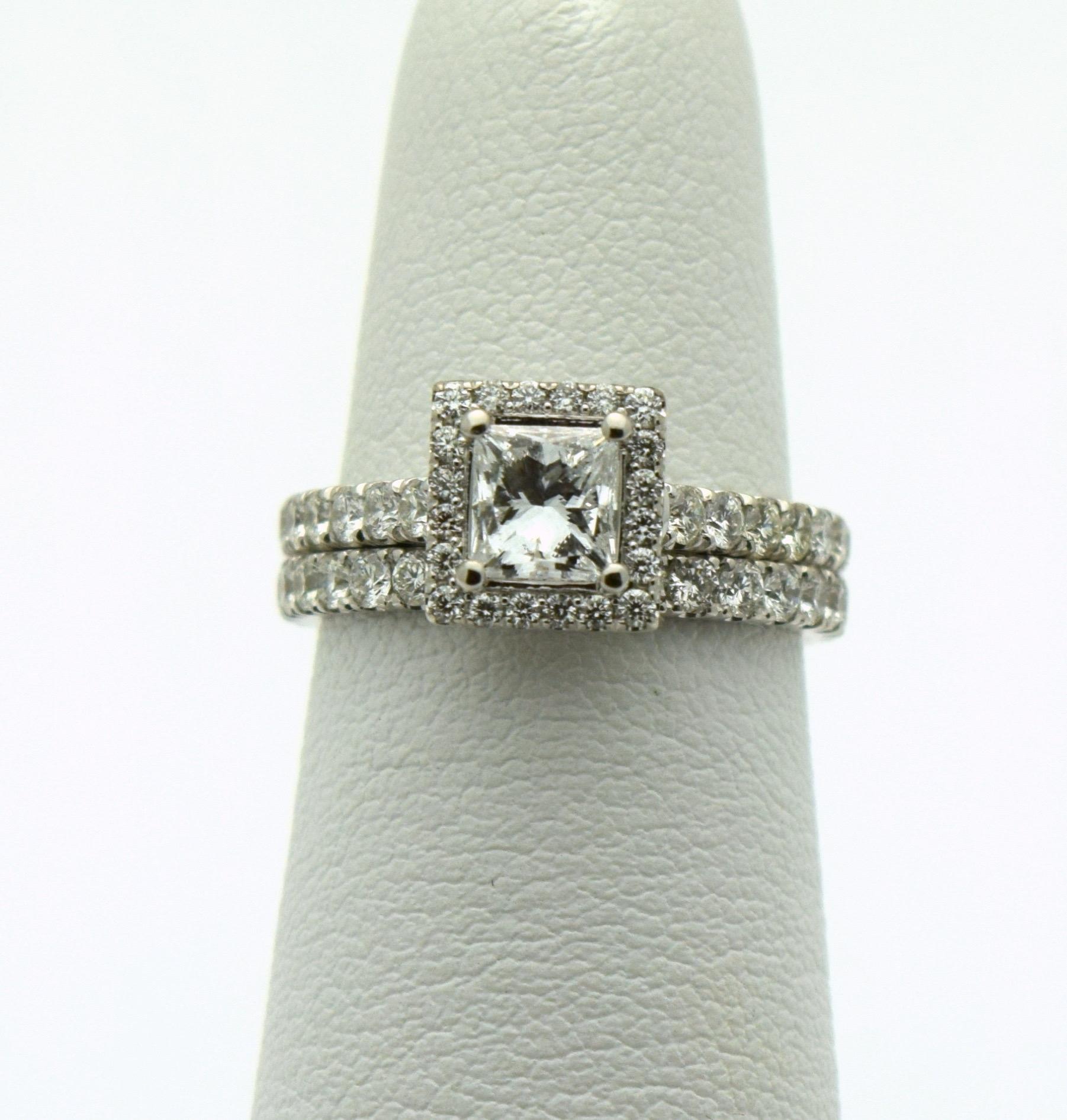 Stunning diamond ring set engagement ring comes with 0.60 carats center(SI1 clarity, F color) and 0.50 carats surrounding diamonds SI clarity and G color, the wedding band is 0.30 carats SI clarity and G color diamonds, the set is modern and made