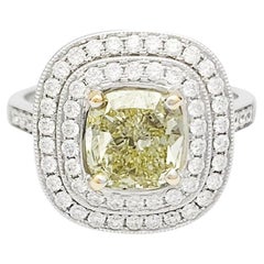Engagement Ring Set with a Fancy Light Yellow Cushion Shaped Diamond