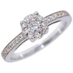 Verlobungsring mit weißen Diamanten und Blumenstrauß aus 18 Karat
