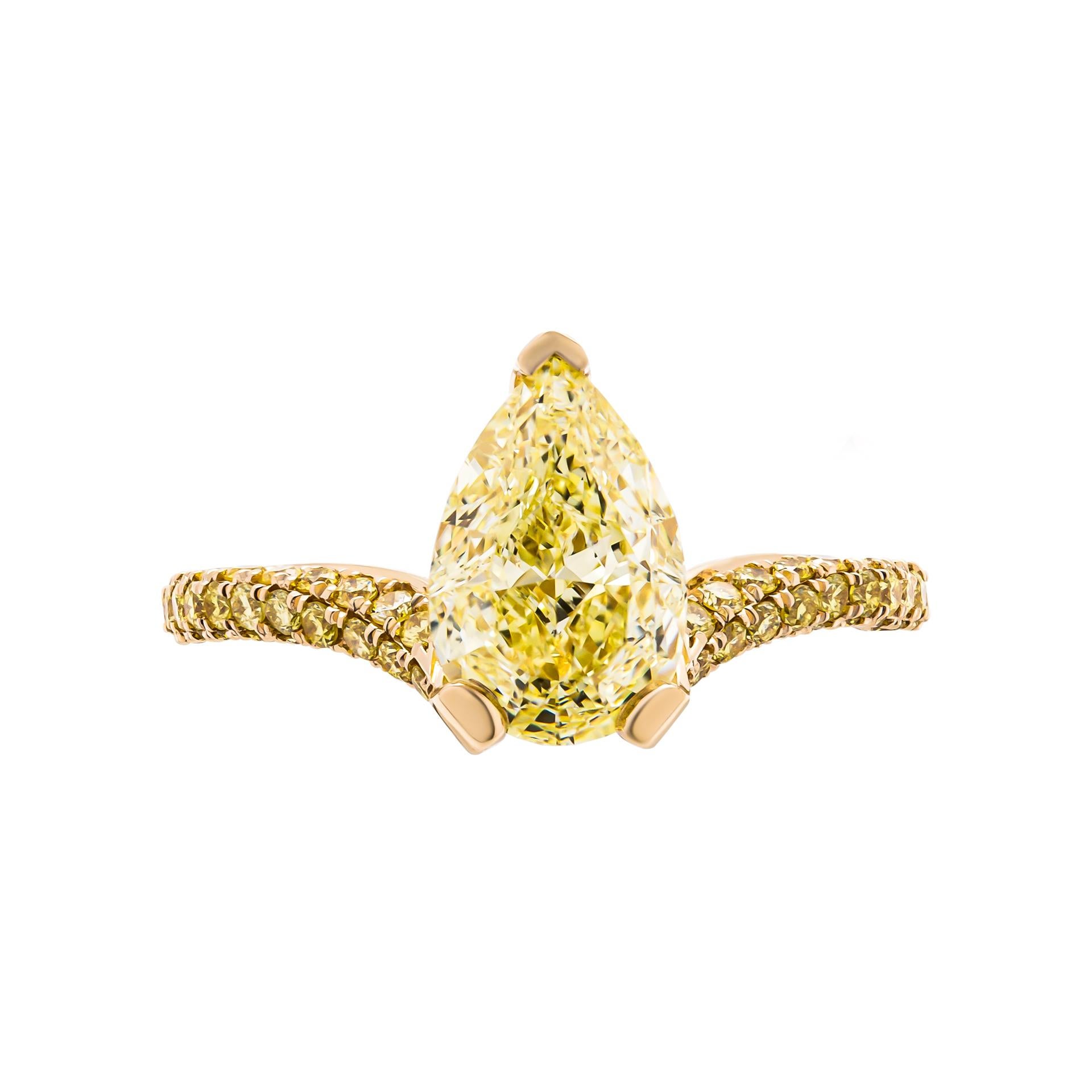 Ring in 18K Yellow gold 
Center stone: 2.01ct Fancy Yellow VVS2 GIA#5211897846 Pear Shape Diamond 
Fancy Yellow Diamond 3 row shank, diamond bridge and diamond prongs totaling  0.65ct 
Size: 5.5
Comes with GIA certificate, appraisal available upon