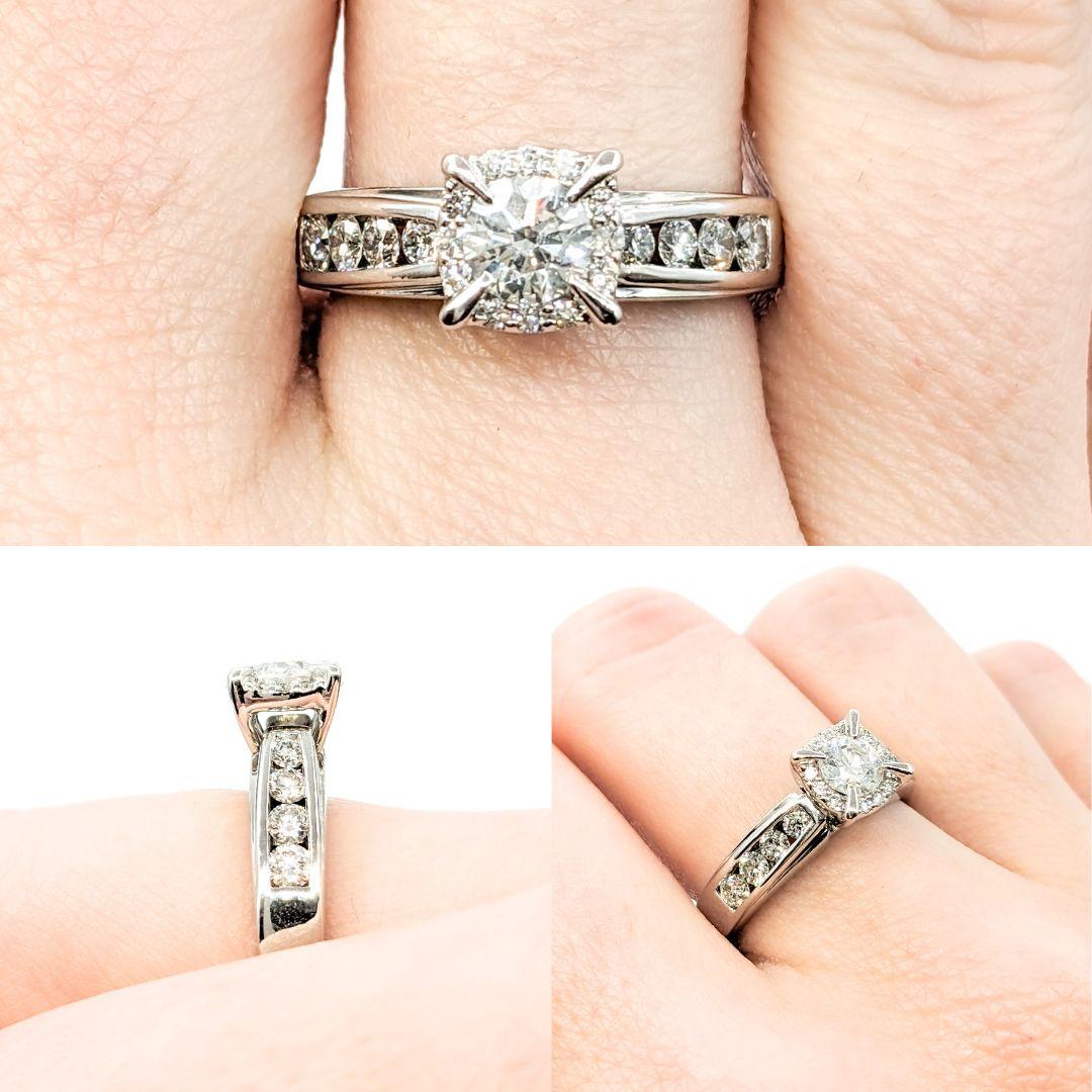 Engagement Ring with Illusion Diamond Halo in White Gold

Introducing this beautiful engagement ring crafted in 14kt white gold. The ring features a .46ct center diamond with an illusion diamond halo and claw prongs, totaling .58ctw in diamonds. The